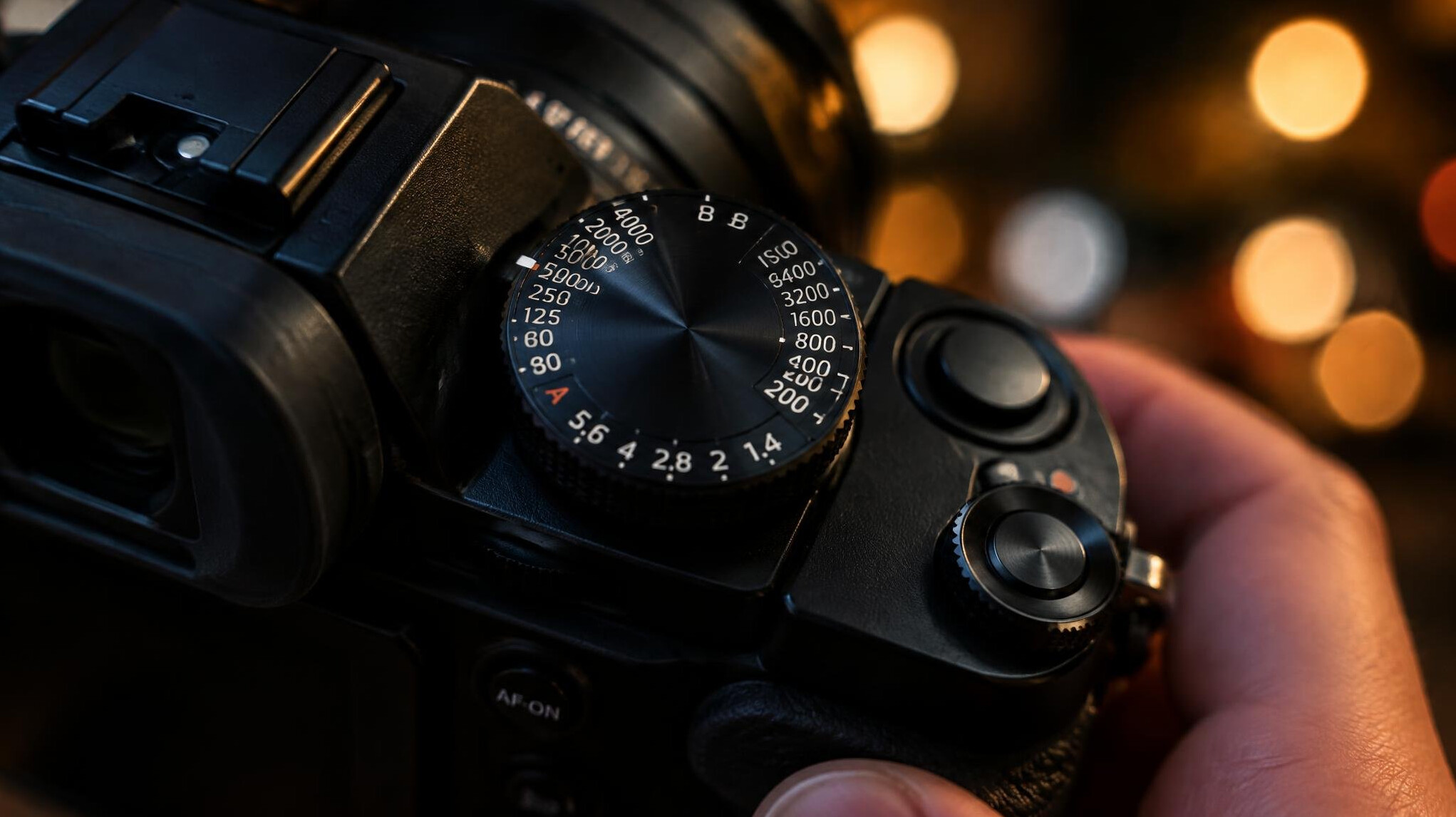 Close-up of camera dials and settings display